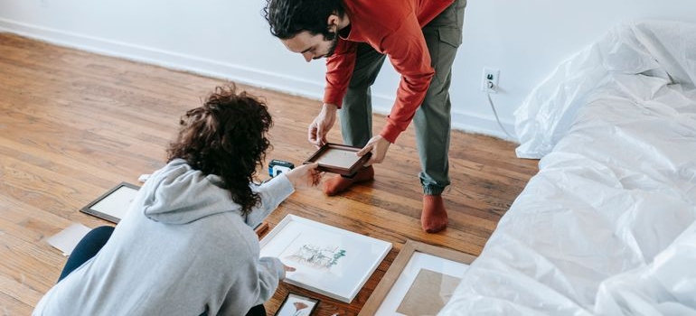 A couple looking at the frames